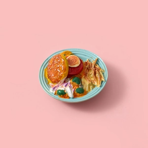 Miniature burger combo with fries in a blue bowl for DIY fridge magnet crafts
