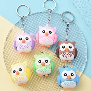 Cute cartoon owl keychain set in six vibrant colors with silver metal rings for students