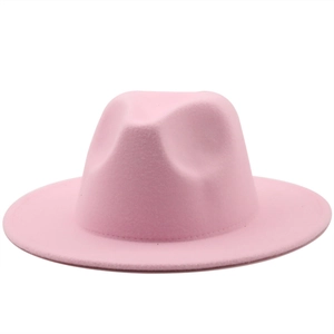 Close-up of pink wool fedora hat showing fine texture on a white background