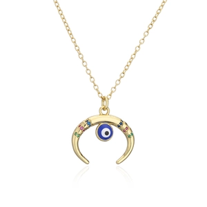 Detail of 18K gold-plated crescent moon pendant with colorful stones and evil eye