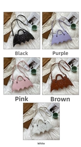 Detailed views of gothic bat wing handbags with spider web stitching in multiple colors