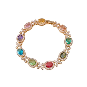 Bracciale vintage dorato con pietre preziose ovali multicolori e maglie a incrocio