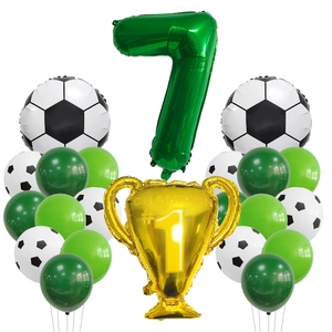 Detail of soccer birthday set with green number 7 balloon and gold champion trophy
