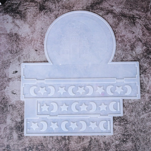 Macro view of transparent silicone mold with mosque and star moon patterns for resin DIY