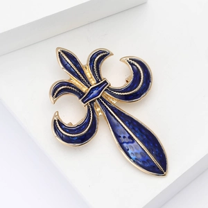 Elegant gold and blue enamel Fleur-de-lis sword brooch with intricate French vintage design
