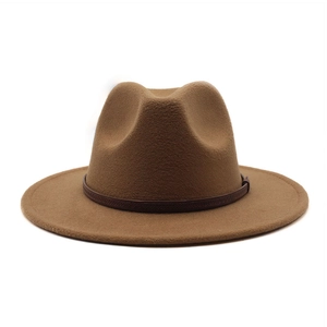Classic dark camel wool fedora hat with brown leather band and wide brim for winter fashion