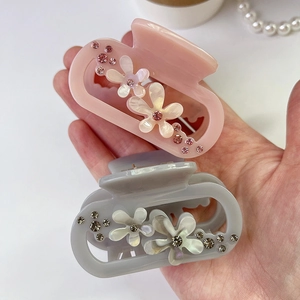 Elegant acetate flower hair claw clips with rhinestones in pink and gray colors
