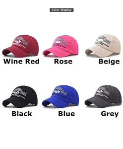 Matrix grid display showing six colors of washed cotton dolphin embroidered baseball caps