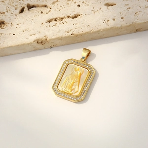 Gold plated shell necklace with mother mary relief and zircon frame on stone