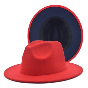 Detail of wide brim wool fedora showing contrast red and navy blue two-tone lining