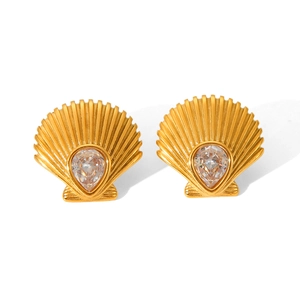 Detailed view of 18K gold plated shell earring with a teardrop zircon gemstone inlay