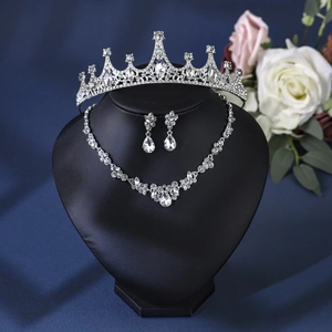 Exquisite silver bridal jewelry set with crystal tiara, necklace and teardrop earrings