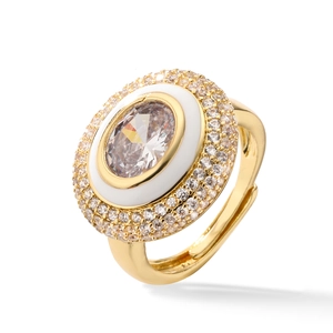Golden open ring with white gemstone and white enamel details in luxury design