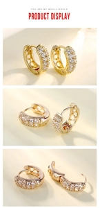 Detailed view of gold hoop earrings with three rows of cubic zirconia and secure hinge