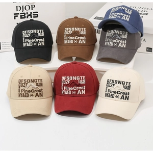 Detailed view of six vintage baseball caps with PineCrest mountain embroidery in diverse colors