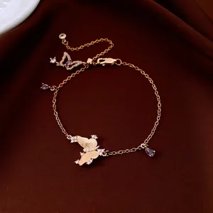 French style gold butterfly bracelet with purple zircon and matte finish wings