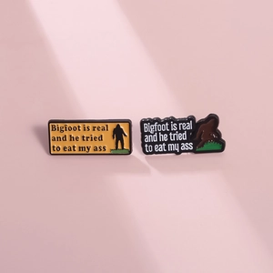 Gothic style Bigfoot enamel pins featuring creative gorilla design and humor slogan