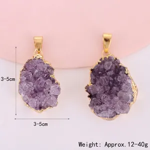 Natural raw amethyst crystal cluster pendant with gold plated edge measuring 3 to 5cm