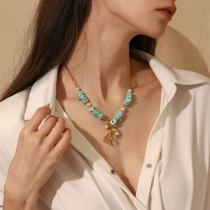 Vintage 18K gold-plated stainless steel necklace with coral charm and turquoise beads