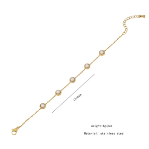 Detailed view of stainless steel gold chain bracelet with pearls and lobster clasp