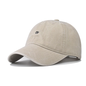 Detail of light beige washed cotton baseball cap with black embroidered R letter logo