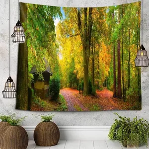 Detail of forest path tapestry hanging on wall showing rich autumn colors and cozy cabin