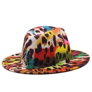 Detailed view of colorful leopard print interior and wide flat brim of the wool fedora hat