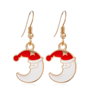 Detail of Christmas earrings featuring red Santa Claus on a white crescent moon charm