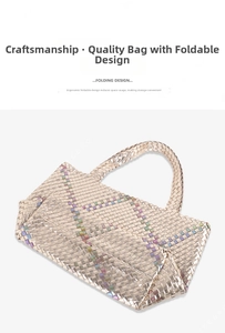 Close-up of luxury woven tote bag with metallic champagne gold finish and foldable design