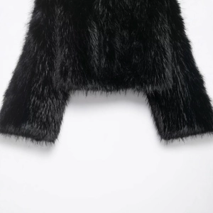 Short black faux fur jacket with high-density texture on a clean white background