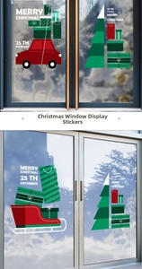 Detail of red car and Christmas tree static window decals for festive shop decoration