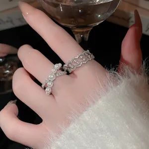 French pearl zircon crossover rings set in silver finish for an elegant women look