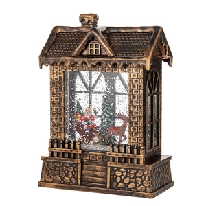 Vintage bronze Christmas lantern with snow globe effect and Santa Claus scene decor