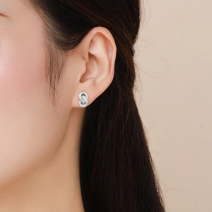 Elegant S925 silver stud earrings with interlocking oval rings and pavé zircon stones