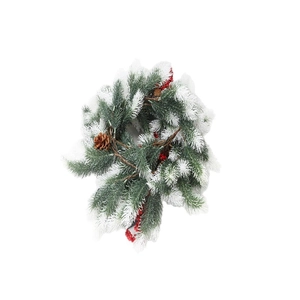 Artificial Christmas wreath with green pine needles, red berries and snow-flocked pinecones