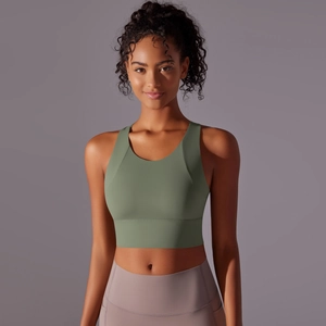 Close-up of avocado green sports bra showing high-elastic fabric and U-neck design