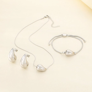 Three-piece silver hollow teardrop jewelry set with necklace bracelet and earrings