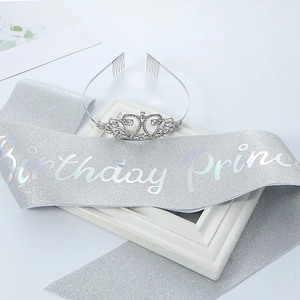 Close-up of glittery silver Birthday Princess sash and sparkling rhinestone tiara set