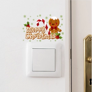 Gingerbread man Christmas switch wall sticker with Merry Christmas greeting on white wall