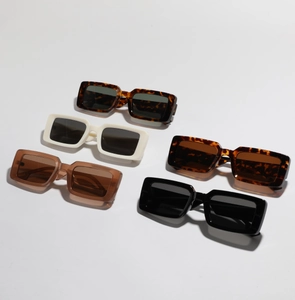 Detailed top view of retro square sunglasses in tortoiseshell, beige and black colors
