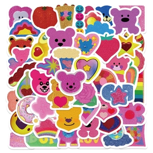 Close-up of glitter waterproof stickers with cute bear, heart, and star shapes