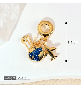 Detail of gold travel charms with blue globe and airplane, height 2.7 cm, weight 2.8 g