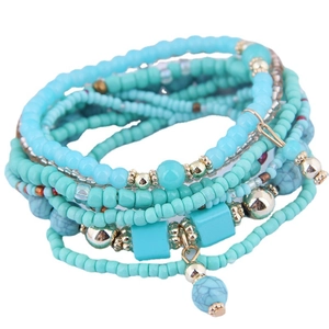 Bohemian multi-layer turquoise bead bracelet with gold accents and marble sphere charm