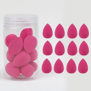 Pink teardrop makeup sponge set in transparent storage jar for seamless blending