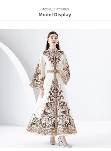 Detail of vintage palace style floral print dress with flared sleeves and stand collar