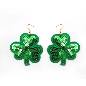 Festive Mardi Gras clover drop earrings with green sequins and gold hooks on white background
