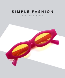 Detail view of pink frame sunglasses with yellow lenses showing ZN3905 size parameters