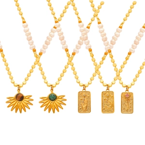 Golden pearl necklace set featuring natural tiger eye stone and celestial pendants