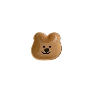 Cute brown cartoon bear ceramic sauce dish for home use on a clean white background
