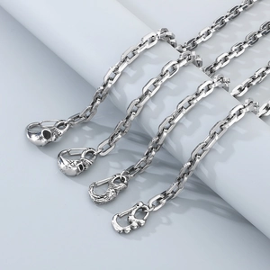 Silver stainless steel box chain necklace featuring a gothic 3D skull pendant clasp
